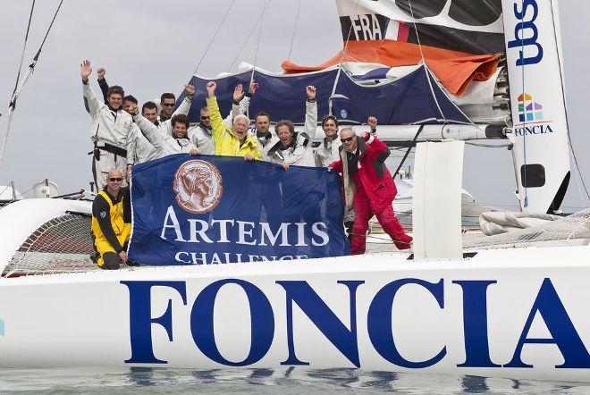 Artemis Challenge 2012 - Foncia celebration – The Foncia crew celebrate their record breaking race around around the island after completing and winning the Artemis Challenge 2012 in just 2hours, 21minutes and 25seconds. Team Foncia: Michel Desjoyeaux, Antoine Carraz, Julien Falxa, Thierry Chabagny, Alban Rossolin, Nicolas Texier, Sir Robin Knox Johnston, Ian Walker, James Boyd and Denis Juhel © Lloyd Images